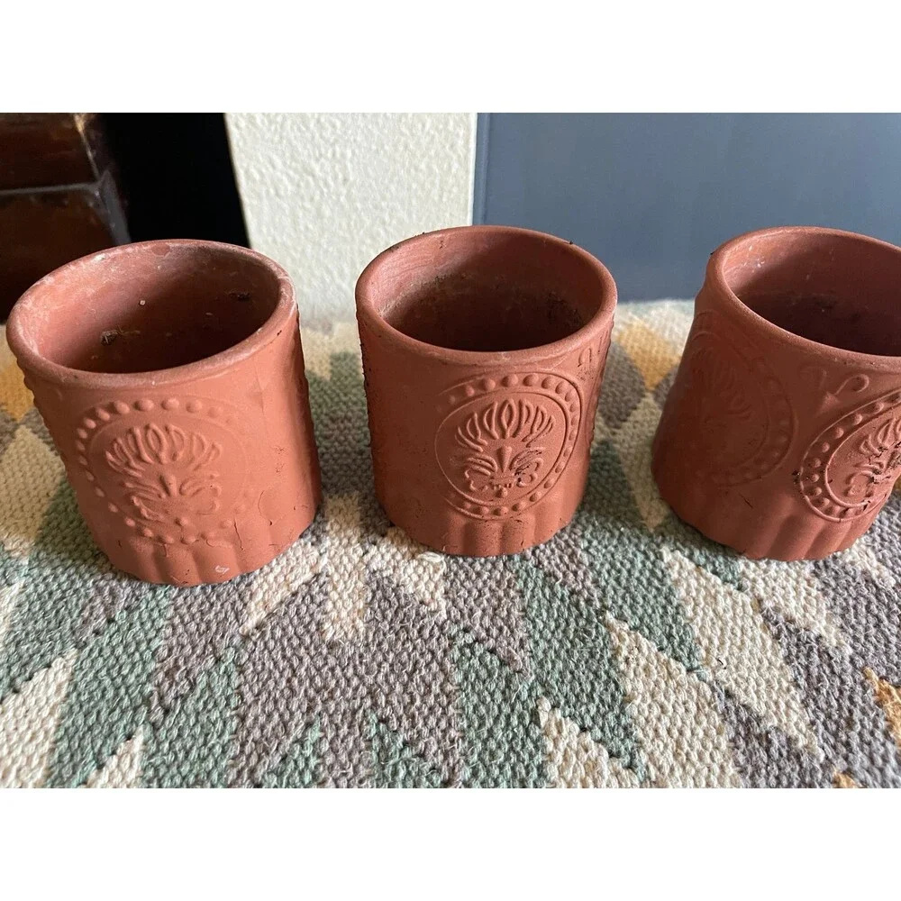 Painted small terra cotta style planters set of 4